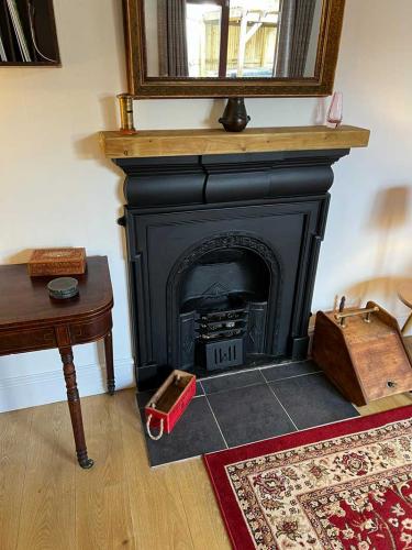 The Old Sorting Office fireplace in lounge.