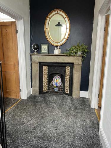 The Old Sorting Office fire place on landing.